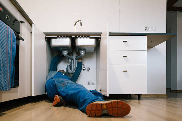 Professional Emergency Plumber technician working in Wellesley, MA